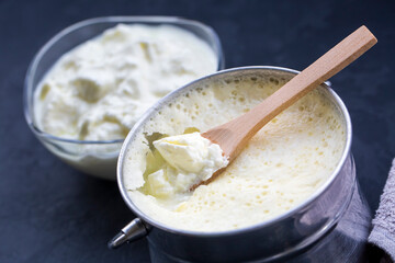 Turkish and Greek traditional dairy food yogurt or yoghurt in a pot (Goat yogurt)
