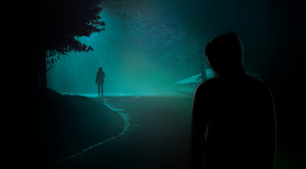 A person walk into the misty foggy road in a dramatic mystic scene with man in the shadow. Mysterious alone woman with stalker walking in the mist. Banner with copy space for text.