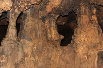 Crimea / Russia. red cave inside. Stalactites and stalagmites
