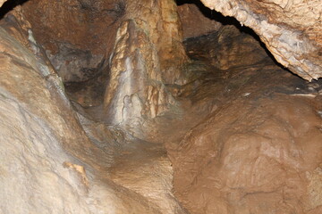 Crimea / Russia. red cave inside. Stalactites and stalagmites