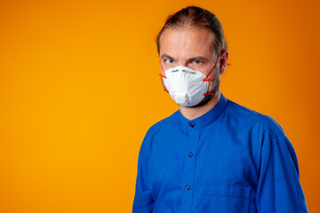 Middle-aged caucasian man wearing medical face mask.