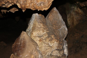 Crimea / Russia. red cave inside. Stalactites and stalagmites