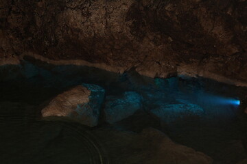 Crimea / Russia. red cave inside. Stalactites and stalagmites