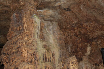 Crimea / Russia. red cave inside. Stalactites and stalagmites