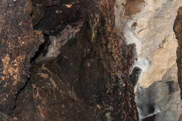 Crimea / Russia. red cave inside. Stalactites and stalagmites
