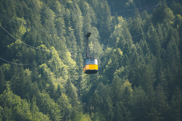 Yellow cable car in the mountains