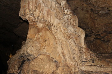 Crimea / Russia. red cave inside. Stalactites and stalagmites