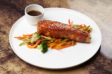 Teriyaki salmon on white plate. Salmon Teriyaki