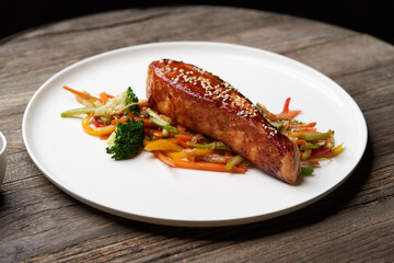 Teriyaki salmon on white plate. Salmon Teriyaki