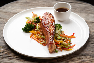 Teriyaki salmon on white plate. Salmon Teriyaki