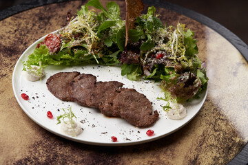 Grilled beef steak with fresh salad. Roasted meat steak