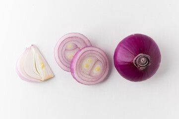 Red onion Sliced in different ways and arranging. Top view Garnish and food ingredients on isolated white background.