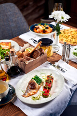 A platter of pike perch and other dishes in the restaurant.