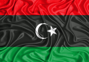 Libya , national flag on fabric texture waving background.