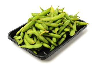 green edamame beans on white background.