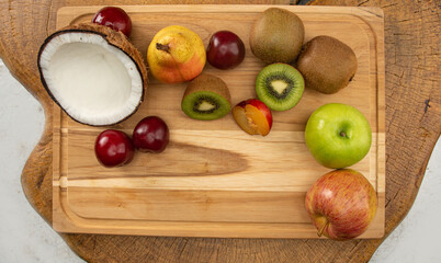 Fruits, beautiful fruit arrangement on wood Top view.