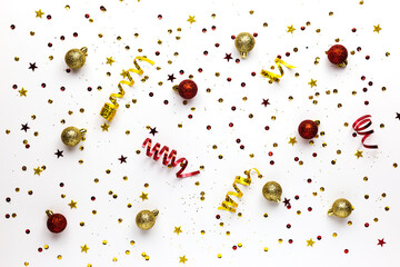 Festive Christmas Golden and red decorations on a white background. Festive new year sparkling texture
