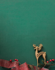 christmas golden reindeer against dark green background vertical image 