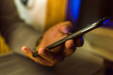 White man with mobile phone and fridge