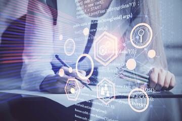 Multi exposure of woman's writing hand on background with data technology hud. Big data concept.