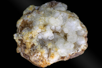 Quartz druse (rock crystal) on a black background, crystalline quartz. Deposit Russia
