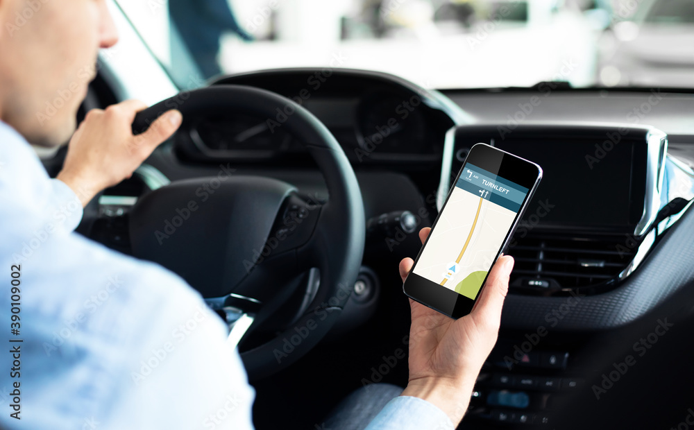 Poster driver using smartphone with car navigation app driving in city