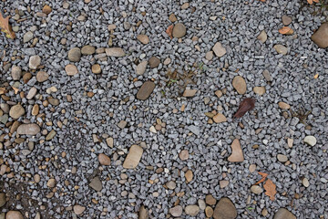 Sharp gray stones in pile for construction. Road or building construction supply. 