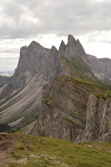 Hiking on the dramatic mountain ridge of Seceda in South Tyrol's Dolomites, Northern Italy