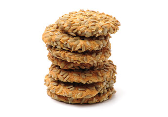 closeup large biscuits with sunflower seeds on white background