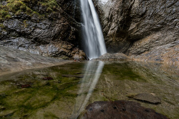 Fototapeta premium waterfall at Chessiloch in Flühli, Entlebuch in autumn, Entlebuch