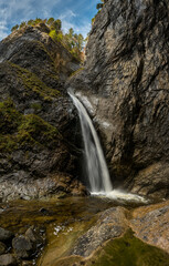Obraz premium waterfall at Chessiloch in Flühli, Entlebuch in autumn, Entlebuch
