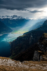 dramatic light into Reussebene wit Altdorf and Urnersee