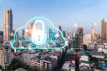 Padlock icon hologram over panorama city view of Bangkok to protect business in Asia. The concept...