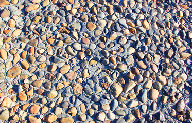 abstract background with dry round stones Sea stones Naturally polished white pebble stone. Colorful small pebbles or stone in the garden with a difference in color. High quality photo