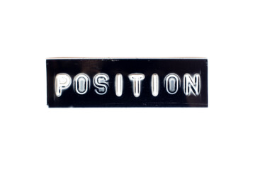 Embossed letter in word position in black banner on white background