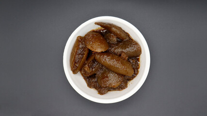 Indian tasty Lemon Pickle also known as Nimbu ka Achar, selective focus