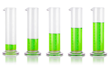 Five glass beakers filled with neon green liquid. Laboratory concept. 