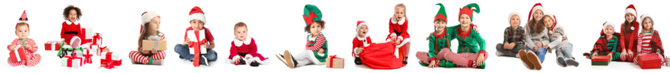 Happy little children with Christmas gifts on white background