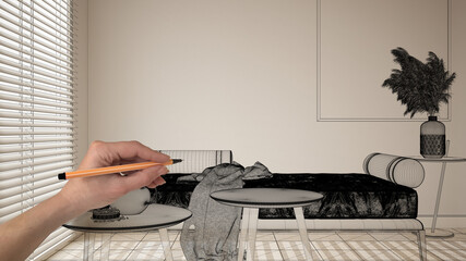 Hand holding pen and drawing on empty modern interior with white walls and parquet, CAD sketch, black ink custom architecture design project. Living room with sofa, coffee tables, tea