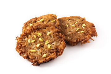 Traditional Jewish latkes or potato pancakes isolated on white background