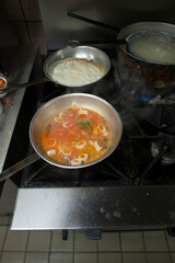 ood preparation in restaurant kitchen.