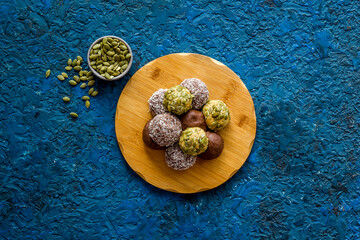 Raw coconut and chocolate energy balls, top view