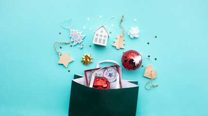 Merry christmas with ornament prop element and shopping bag on color background.winter season's greeting