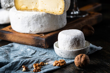 Various types of cheese composition. Gorgonzola, camembert, brie cheese. Roquefort, dor blue....