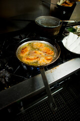 ood preparation in restaurant kitchen.
