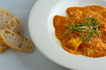Pesto Pasta with jumbo shrimp and pesto sauce (extra virgin olive oil, pine nuts and basil), mixed with fresh chopped asparagus and halved cherry tomatoes served over homemade pasta & seasoned w/ s&p.