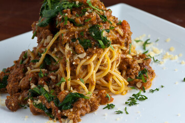 Pesto Pasta with jumbo shrimp and pesto sauce (extra virgin olive oil, pine nuts and basil), mixed with fresh chopped asparagus and halved cherry tomatoes served over homemade pasta & seasoned w/ s&p.