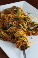 Pesto Pasta with jumbo shrimp and pesto sauce (extra virgin olive oil, pine nuts and basil), mixed with fresh chopped asparagus and halved cherry tomatoes served over homemade pasta & seasoned w/ s&p.