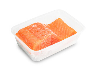 Piece of fresh salmon fillet sliced in plastic box isolated on white background ,include clipping path