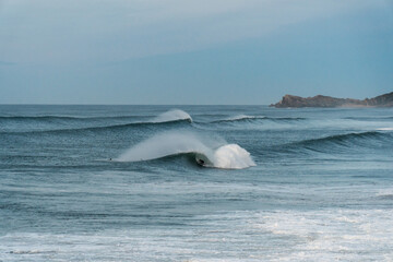 Naklejka premium Perfect surfing spot in a nice autumn evening in north Spain